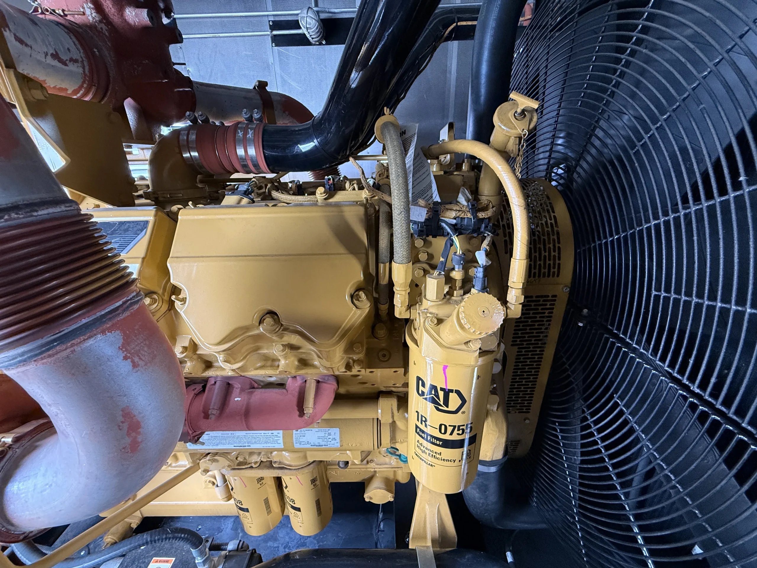 2011 CAT C27 750kW Fuel Filter and Radiator Side scaled 1 CAT C27 750kW 480V Diesel Generator Set - Image 10
